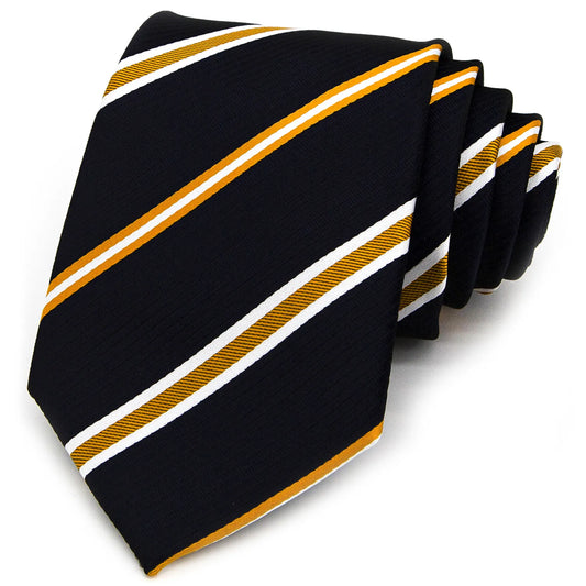A deep blue men's necktie featuring bold diagonal stripes in gold and white is tied in a four-in-hand knot on a crisp white button-down shirt, suitable for business and impactful style.