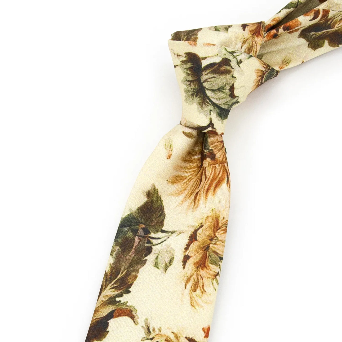 A neatly rolled cream-colored men's necktie displaying its vintage floral pattern with brown, orange, and green blooms and foliage against a clean white surface.