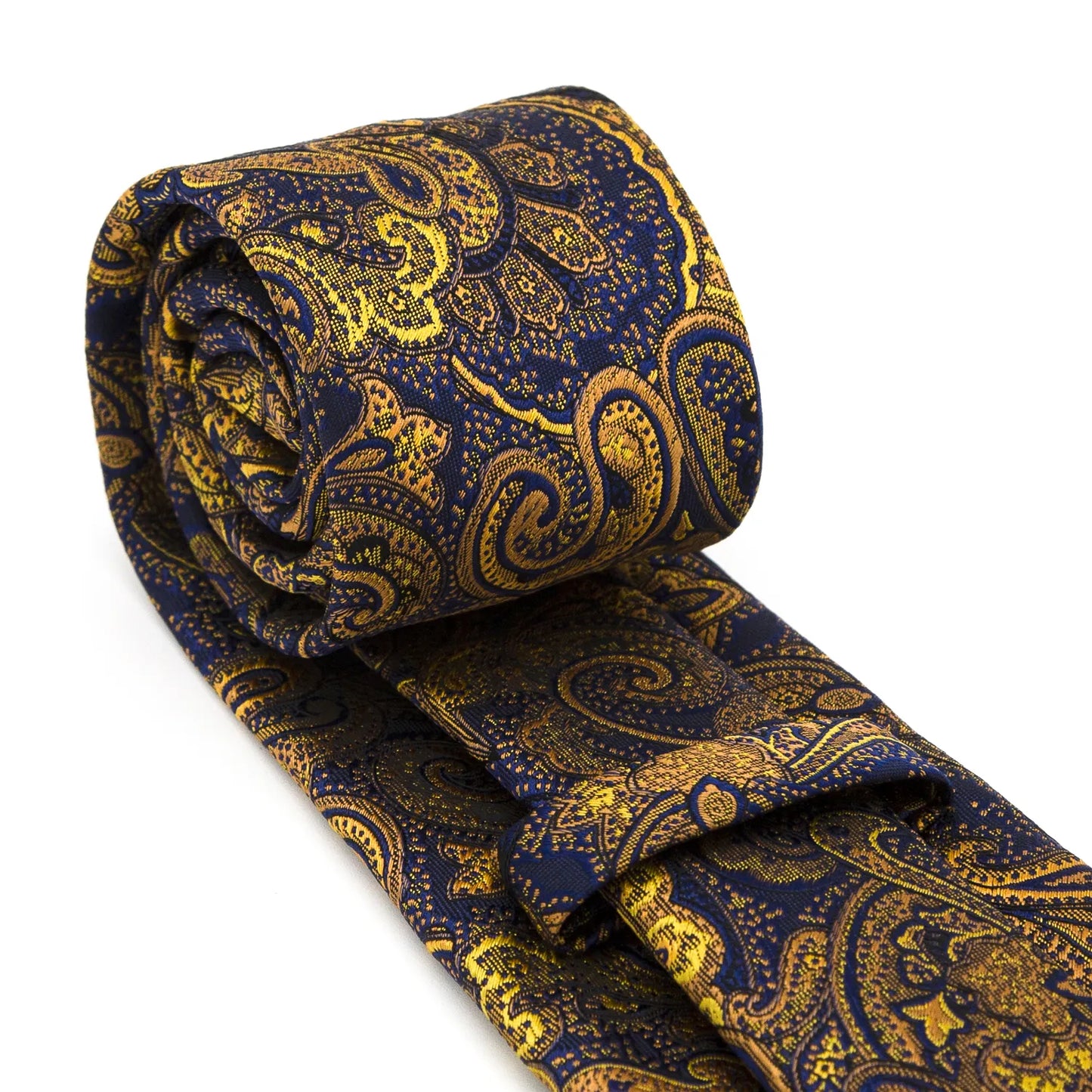 A navy blue and gold paisley tie neatly rolled and presented on a white background, highlighting its rich texture and detailed pattern.