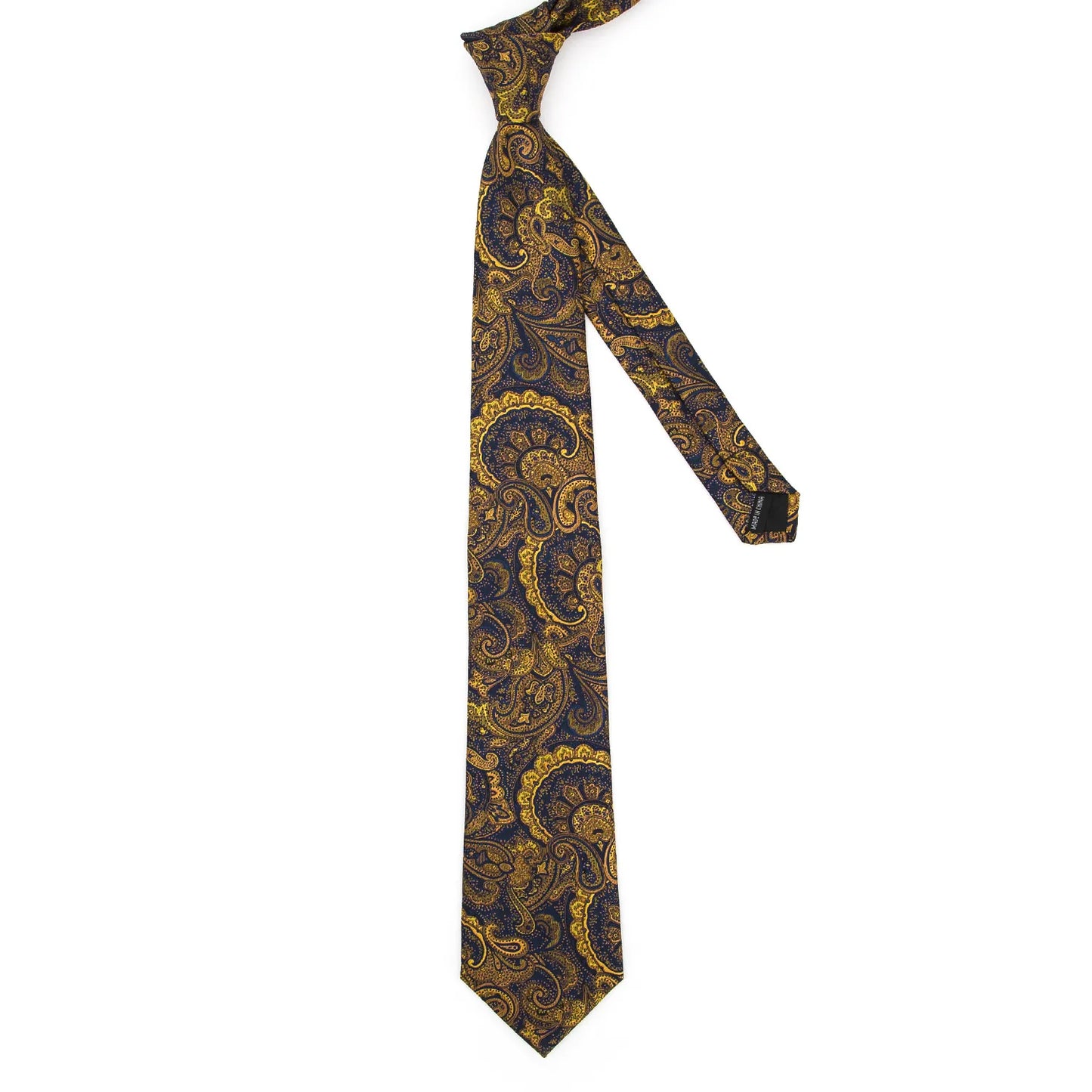 A full-length view of a navy blue and gold paisley tie, knotted at the top and extending downwards, illustrating its elegant drape.