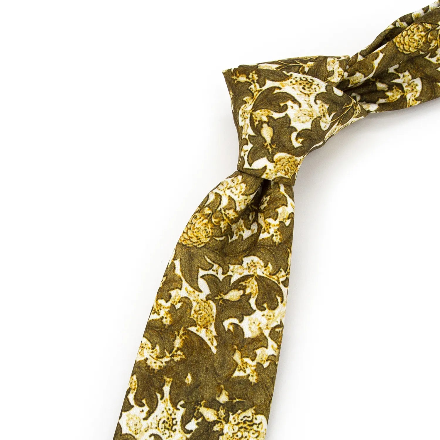 A neatly folded olive green men's necktie showcasing its intricate vintage floral design in beige and brown against a plain white surface.