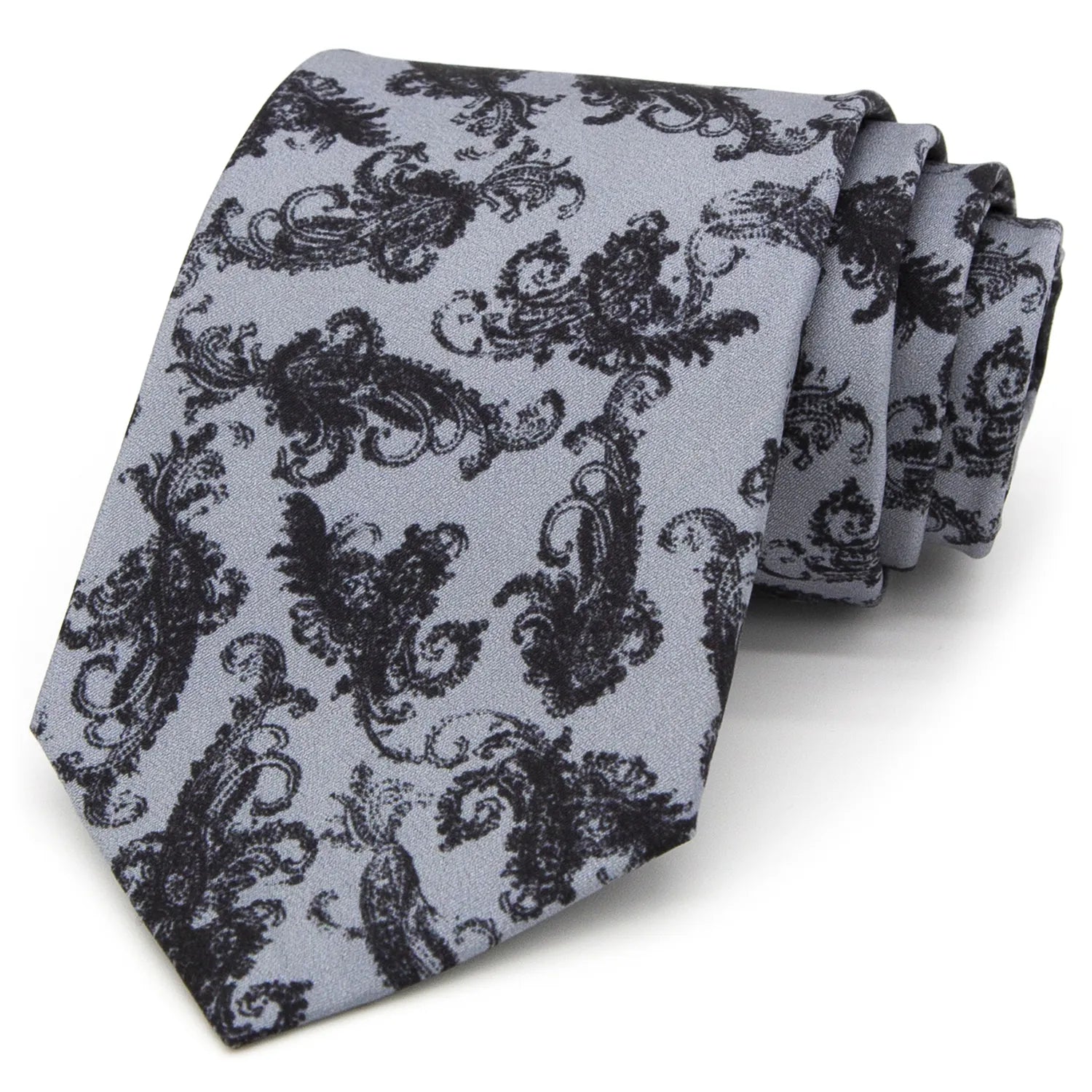 A light grey men's necktie from XueDouLing Tie featuring a delicate black paisley pattern is casually knotted against a white background.