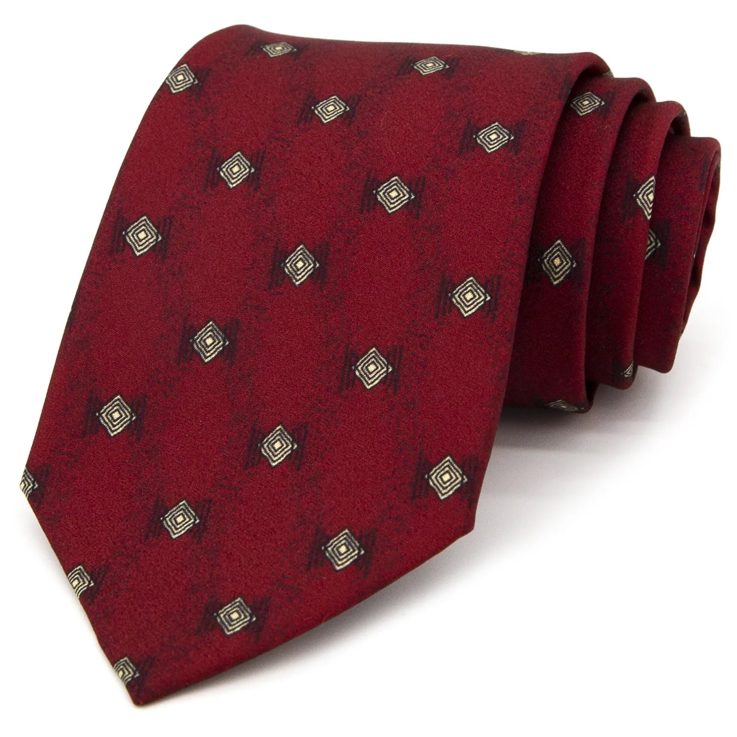 A deep red men's necktie featuring a repeating pattern of small, detailed diamonds in beige and black is casually knotted against a white background.