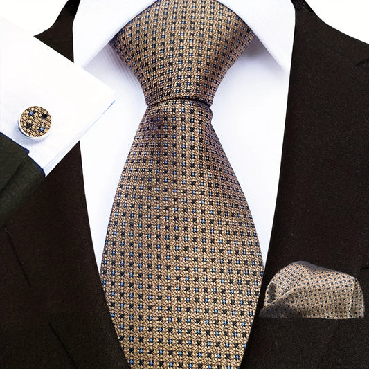 A set of men's formal attire including a brown and gold geometric patterned necktie, matching pocket square, and cufflinks, displayed on a white background.