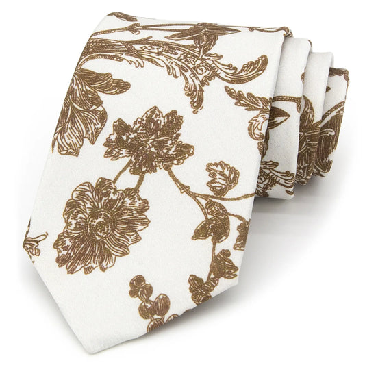 A light off-white men's necktie featuring a subtle and refined floral pattern in shades of brown is casually knotted against a white background.