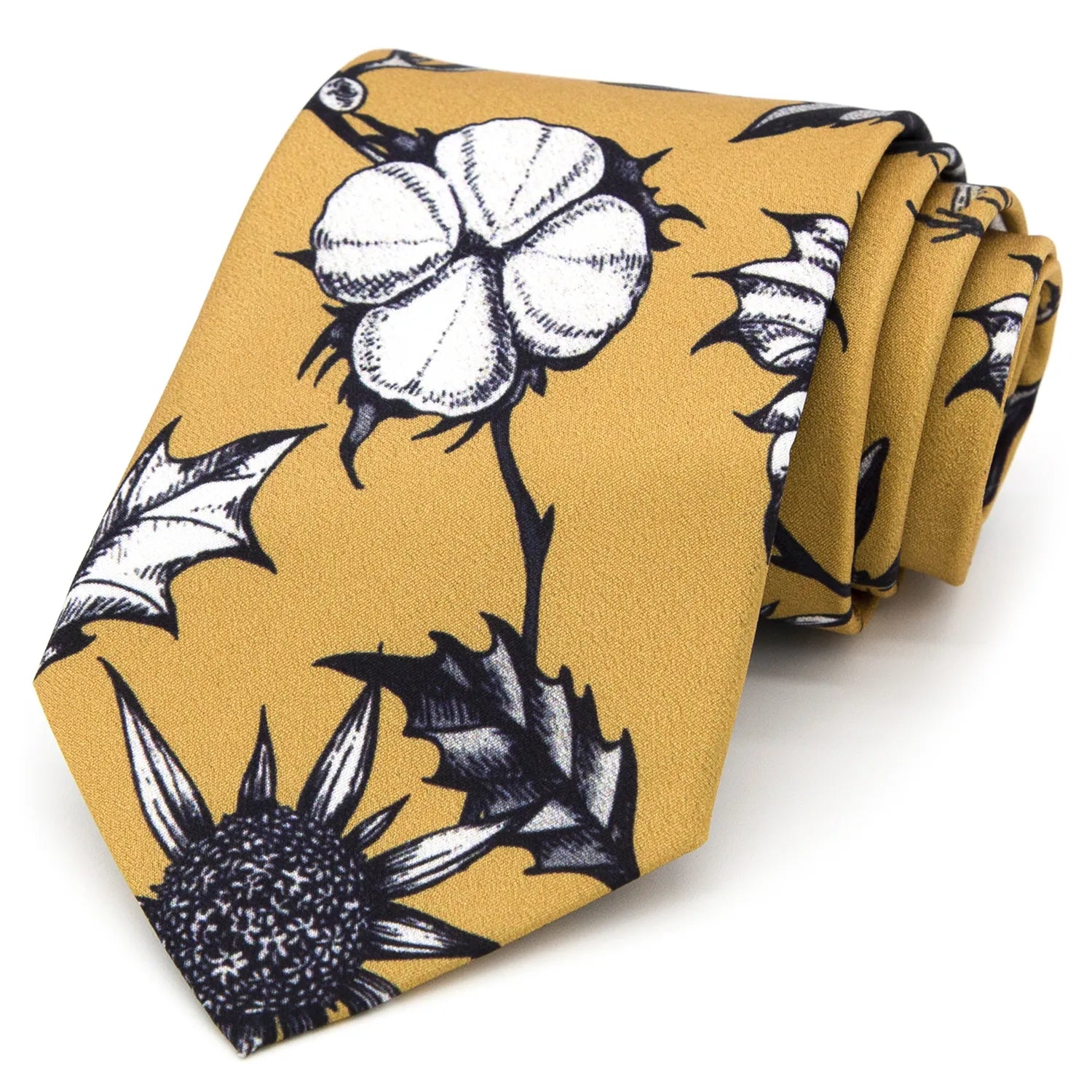 A mustard yellow men's necktie featuring a unique botanical pattern with black and white thistle and cotton plant illustrations is casually knotted against a white background.