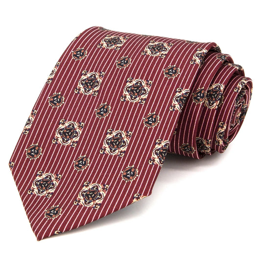 A close-up of a rich wine red men's necktie featuring small, regularly spaced white polka dots, highlighting the bold color and classic pattern.