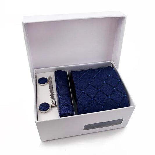 The XueDouLing Tie premium tie set is displayed, showing the elegant deep purple checkered necktie with its matching pocket square and sleek cufflinks, presented neatly as a cohesive accessory package.