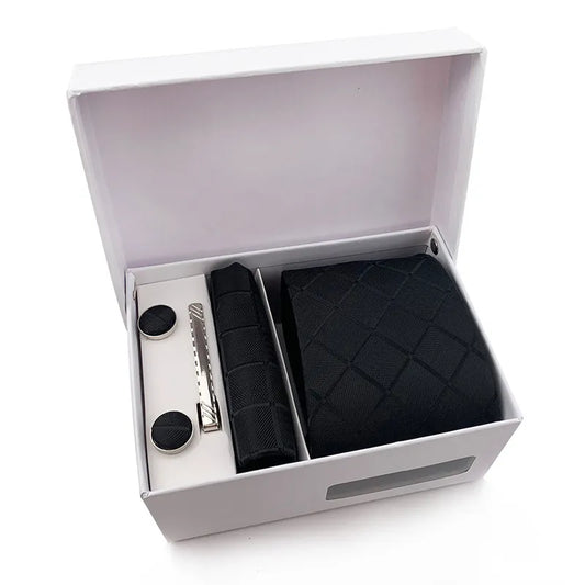 The XueDouLing Tie premium tie set is displayed, showing the contemporary brown abstract wave pattern necktie with its matching pocket square and sleek cufflinks, presented neatly as a cohesive accessory package.