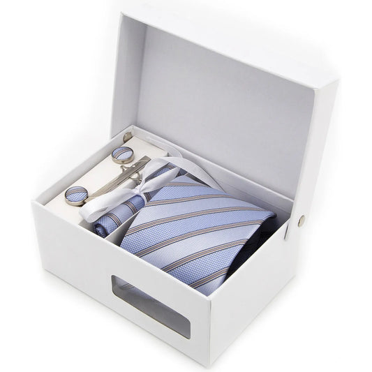 A full view of the luxurious light blue-grey men's necktie from XueDouLing Tie, neatly laid flat, clearly highlighting its subtle dark blue and white micro-dot pattern, emphasizing its refreshing texture and refined modern design.