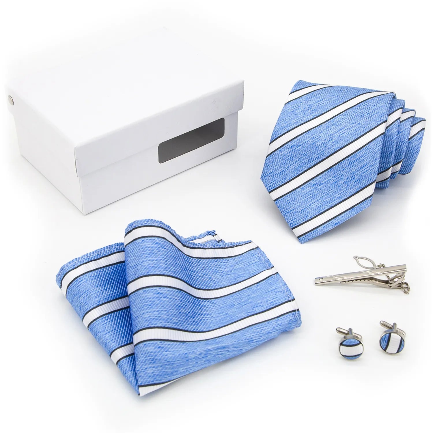 The XueDouLing Tie serene blue geometric tie set is meticulously arranged inside a gift box, showcasing the patterned necktie, coordinating pocket square, and polished cufflinks, ready for gifting or immediate use.