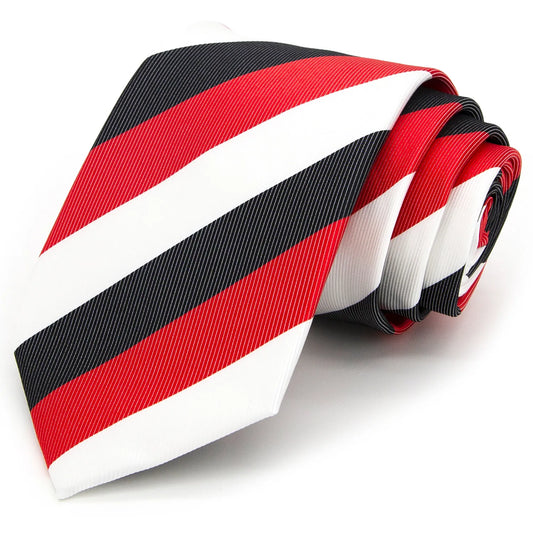 Neatly tied men's tie with prominent black white and red diagonal stripes shown on a crisp white shirt ready for a sharp sophisticated ensemble