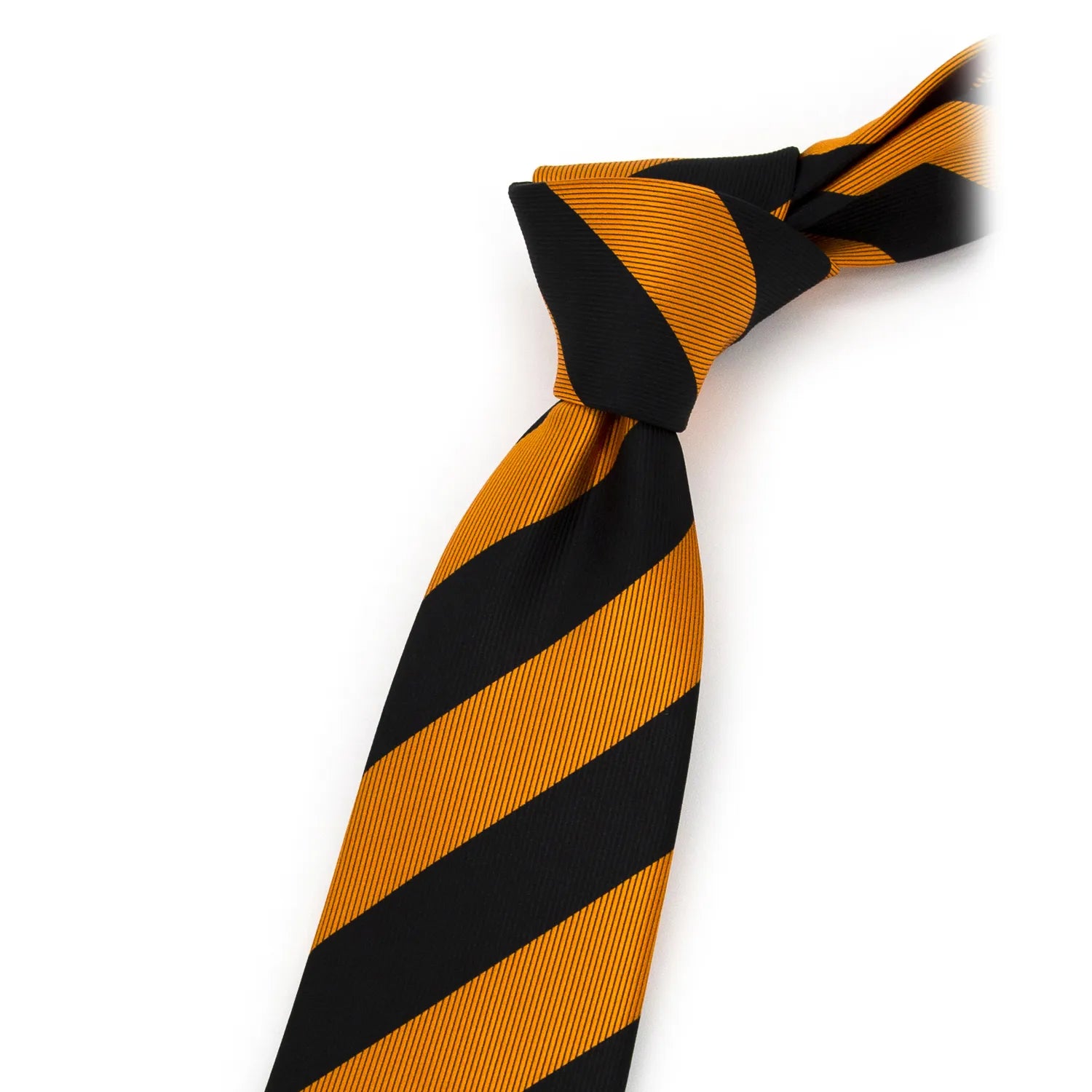 Rolled black and gold striped silk tie, displaying the full pattern and luxurious sheen of the fabric.