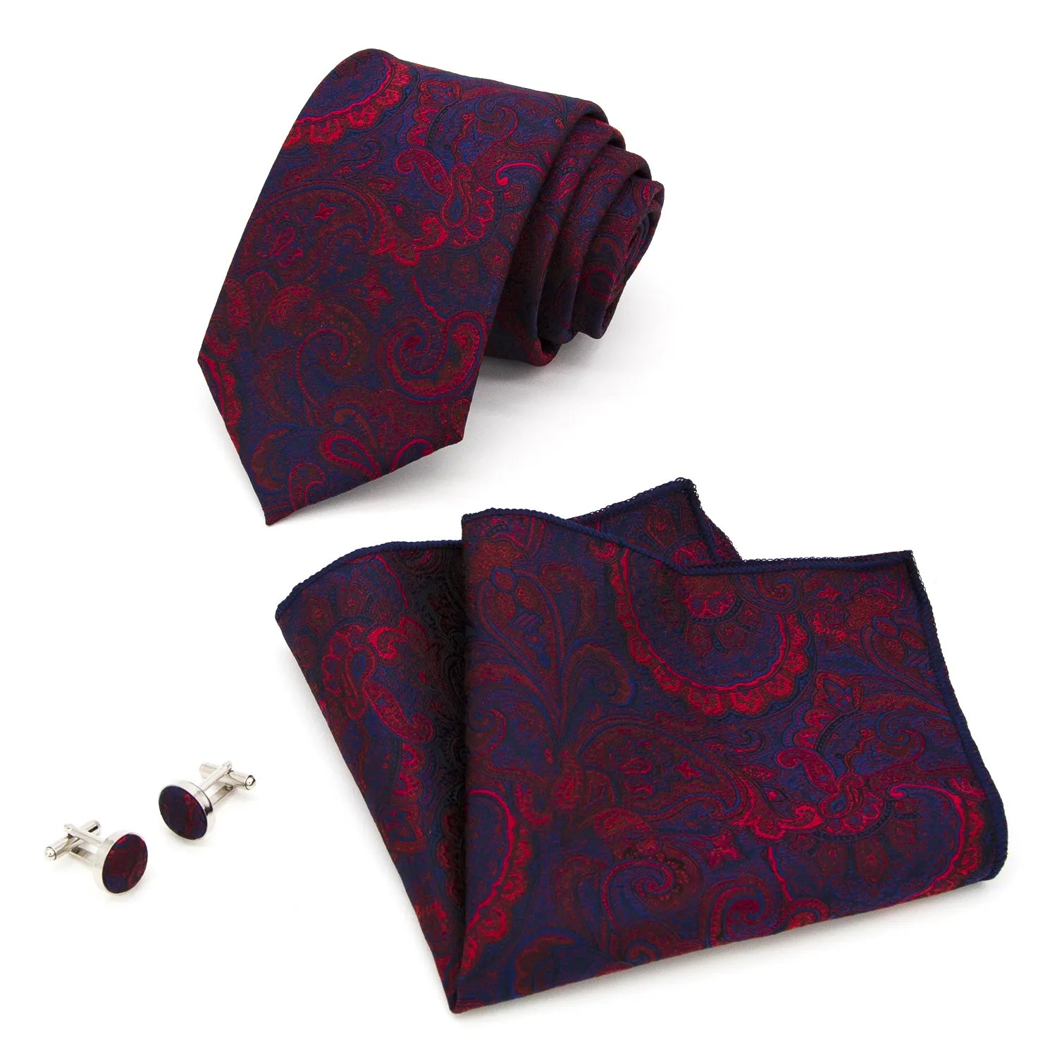 Complete set featuring a rolled polyester tie, a folded square pocket, and two round cufflinks, all showcasing a vibrant red and navy paisley pattern against a white background.