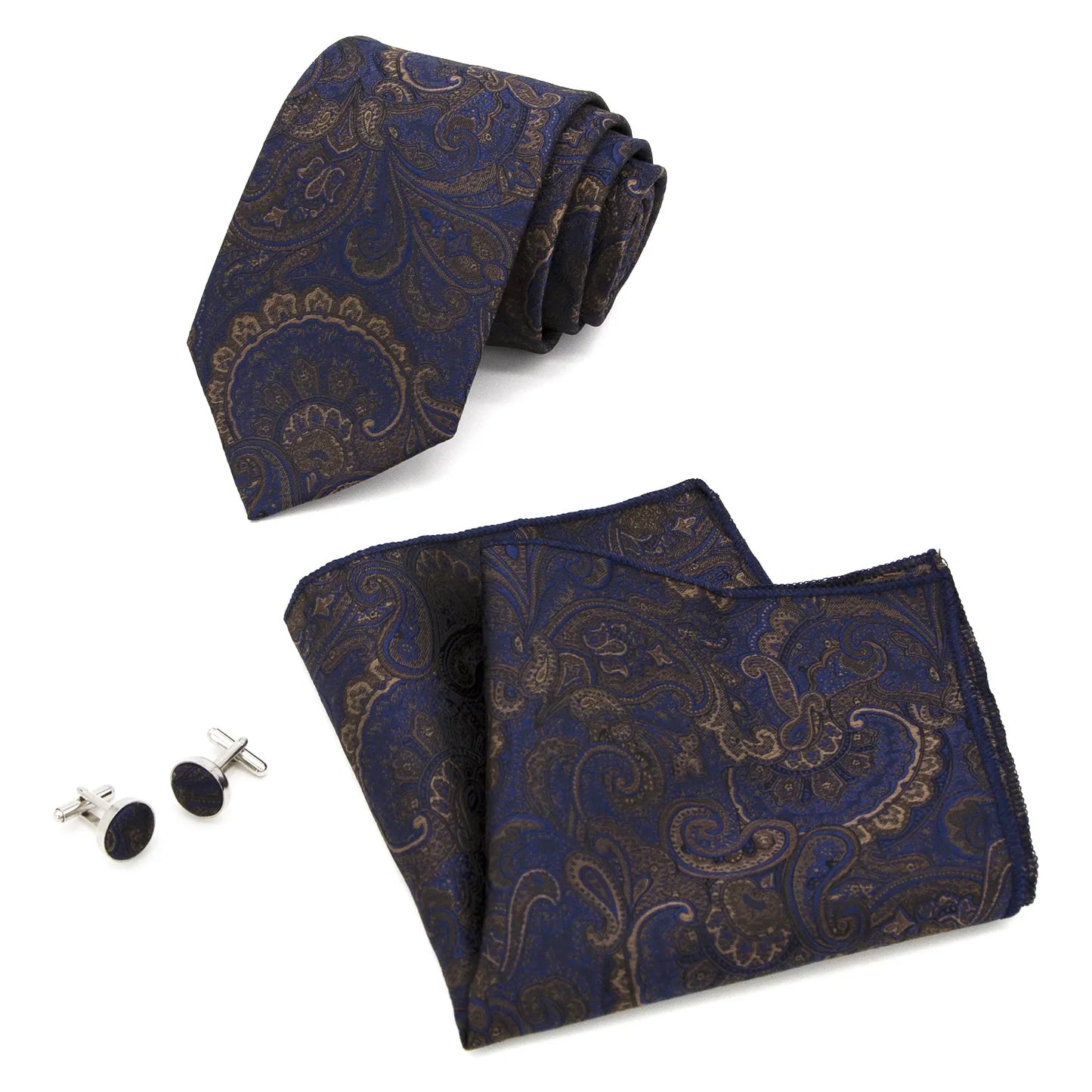 A coordinated set featuring a rolled dark blue and bronze paisley polyester tie, a folded matching pocket square, and two round cufflinks, all displaying an intricate pattern on a white background.